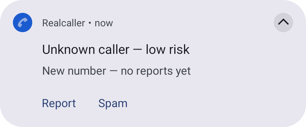 Realcaller card: “Unknown caller, low risk”, new number with no reports yet.